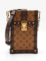 Louis Vuitton Pochette Trunk Verticale In Reverse Monogram Coated Canvas Fw0626loxzdu
