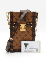 Louis Vuitton Pochette Trunk Verticale In Reverse Monogram Coated Canvas Fw0626loxzdu
