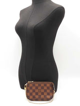 Louis Vuitton Mini Pochette Accessoire In Damier Ebene Coated Canvas Fw1225ozxdu