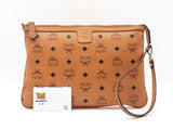 Mcm Stark Wristlet Pouch In Cognac Visetos Coated Canvas Fw0425lrzdu