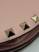 Valentino Garavani Rockstud Mini Saddle Bag In Pink Grained Leather Fw1225oxzdu