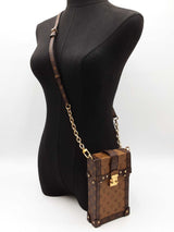 Louis Vuitton Pochette Trunk Verticale In Reverse Monogram Coated Canvas Fw0626loxzdu