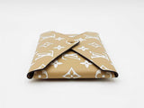 Louis Vuitton Medium Kirigami Pochette In Tan Monogram Giant Coated Canvas Fw0726lrxdu
