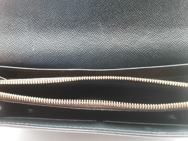 Louis Vuitton Reversed Monogram Sarah Wallet Brown Aa1025wrxsa