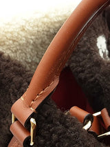 Louis Vuitton Onthego "Teddy" In Monogram Giant Shearling Fw0626llxzdu