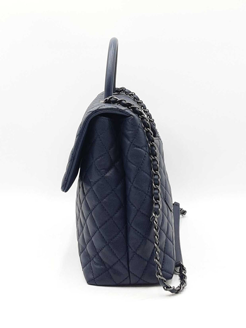 Chanel Coco Top Handle Flap Bag In Navy Blue Quilted Caviar Leather Fw0925ooxzdu