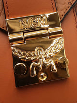 Mcm Patricia Crossbody Phone Case In Cognac Visetos Coated Canvas Fw0526lrzdu