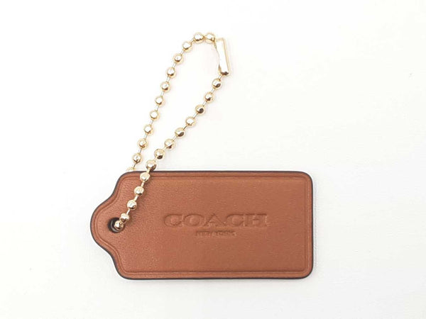 Coach Logo & Star Hang Tag In Brown Leather Fw0725lxdu