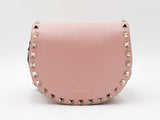 Valentino Garavani Rockstud Mini Saddle Bag In Pink Grained Leather Fw1225oxzdu