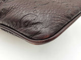 Gucci Britt Wristlet In Dark Brown Guccissima Embossed Leather Fw0826lexdu