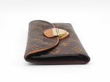 Louis Vuitton Eugenie Wallet In Monogram Coated Canvas Fw0925lordu