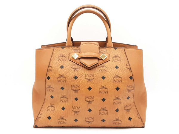 Mcm Essential Medium Tote Bag In Cognac Visetos Coated Canvas Fw0525ozxdu