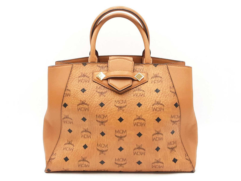 Mcm Essential Medium Tote Bag In Cognac Visetos Coated Canvas Fw0525ozxdu