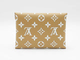 Louis Vuitton Medium Kirigami Pochette In Tan Monogram Giant Coated Canvas Fw0726lrxdu