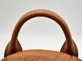 Mcm Patricia Visetos Coated Canvas Mini Handbag In Cognac Fw1124lxzdu