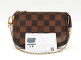 Louis Vuitton Mini Pochette Accessoire In Damier Ebene Coated Canvas Fw1225ozxdu