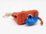 Mini Barkin Doggie Waste Bag Dispenser Charm In Orange Fw1025cdu
