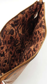 Mcm Stark Wristlet Pouch In Cognac Visetos Coated Canvas Fw0425lrzdu