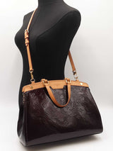 Louis Vuitton Brea Mm Handbag In Monogram-embossed Burgundy Vernis Fw0526pzxdu