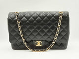 Chanel Maxi Double Flap Handbag In Black Caviar Leather Fw0125rxzxdu