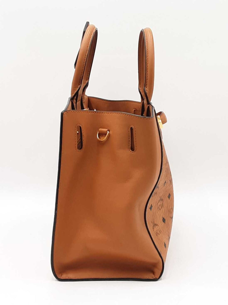 Mcm Essential Medium Tote Bag In Cognac Visetos Coated Canvas Fw0525ozxdu