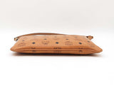 Mcm Stark Wristlet Pouch In Cognac Visetos Coated Canvas Fw0425lrzdu