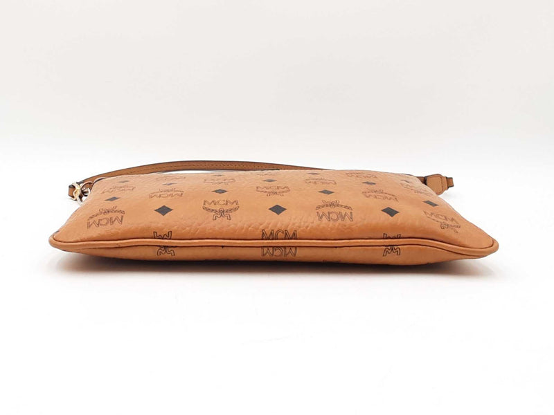 Mcm Stark Wristlet Pouch In Cognac Visetos Coated Canvas Fw0425lrzdu