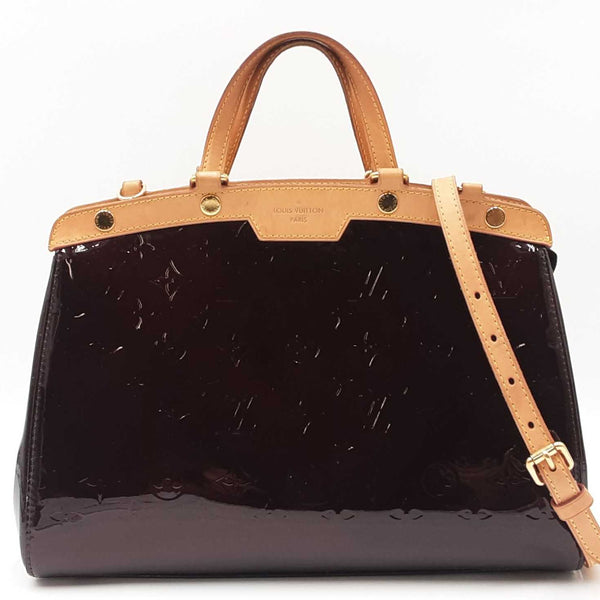 Louis Vuitton Brea Mm Handbag In Monogram-embossed Burgundy Vernis