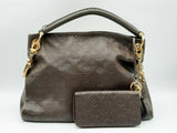 Louis Vuitton Artsy Mm Empreinte Leather Hobo Bag Fw1224ixzdu