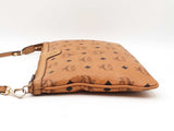 Mcm Stark Wristlet Pouch In Cognac Visetos Coated Canvas Fw0425lrzdu