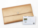 Louis Vuitton Porte Tresor International Wallet In Gold Monogram Mat Leather Fw0726erdu