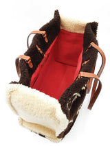 Louis Vuitton Onthego "Teddy" In Monogram Giant Shearling Fw0626llxzdu