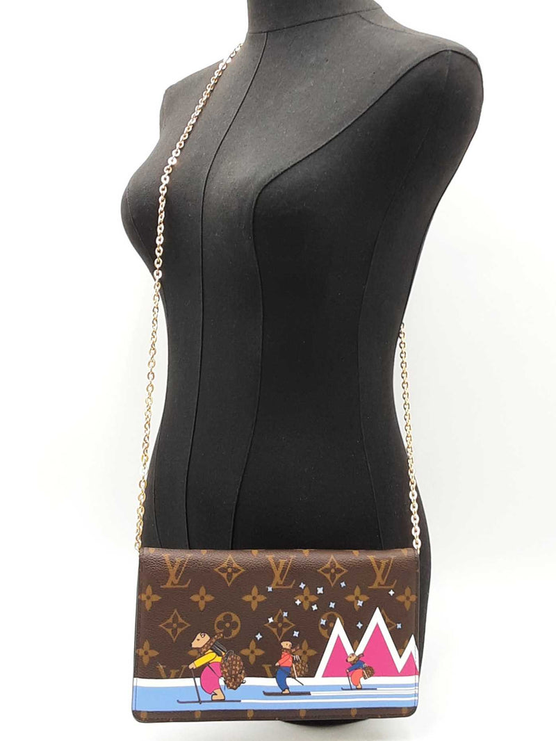 Louis Vuitton Christmas 2018 Skiing Bears Pochette Weekend Bag In Monogram Coated Canvas Fw0625crxdu