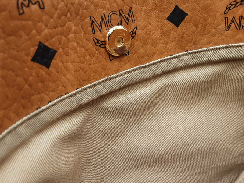 Mcm Medium Pouch Pocket In Cognac Visetos Monogram Coated Canvas Fw0125crdu