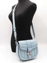 Coach Georgie Saddle Bag In Baby Blue Puffy-quilted Leather Fw1225sxdu