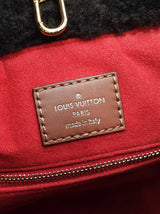 Louis Vuitton Onthego "Teddy" In Monogram Giant Shearling Fw0626llxzdu