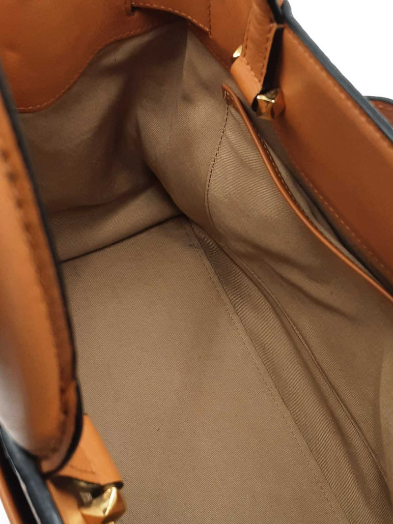 Mcm Essential Medium Tote Bag In Cognac Visetos Coated Canvas Fw0525ozxdu