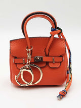 Mini Barkin Doggie Waste Bag Dispenser Charm In Orange Fw1025cdu