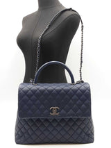 Chanel Coco Top Handle Flap Bag In Navy Blue Quilted Caviar Leather Fw0925ooxzdu