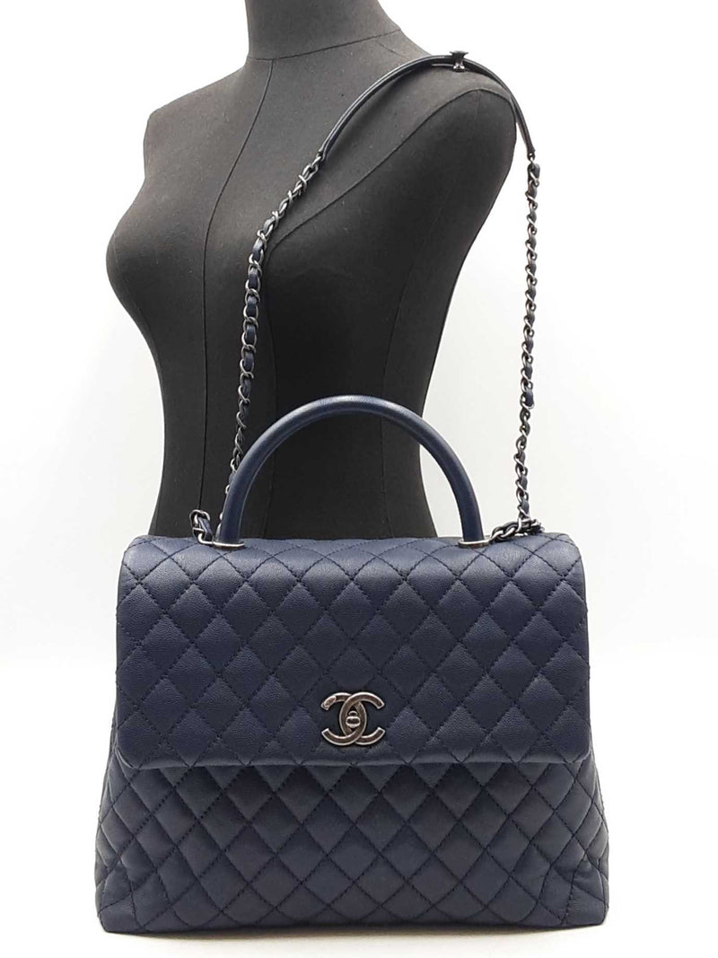 Chanel Coco Top Handle Flap Bag In Navy Blue Quilted Caviar Leather Fw0925ooxzdu