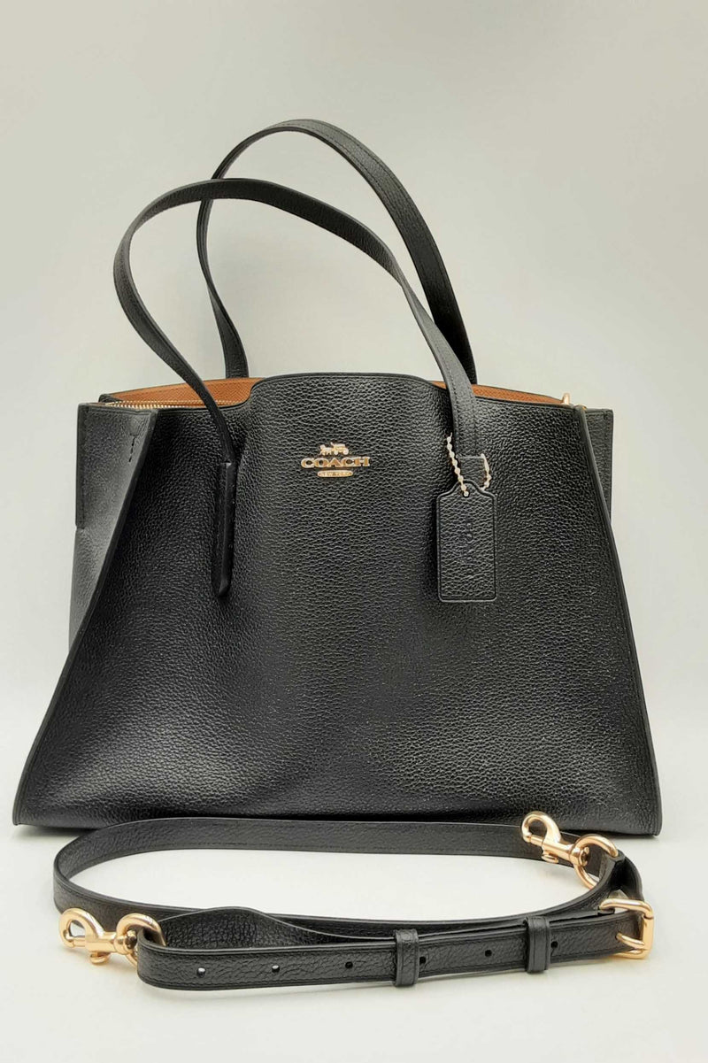 Coach charlie carryall black on sale