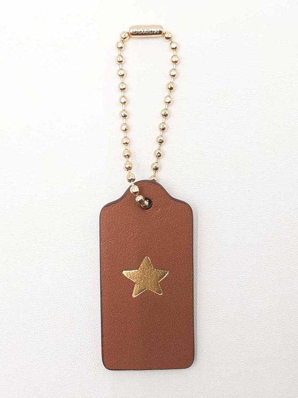Coach Logo & Star Hang Tag In Brown Leather Fw0725lxdu