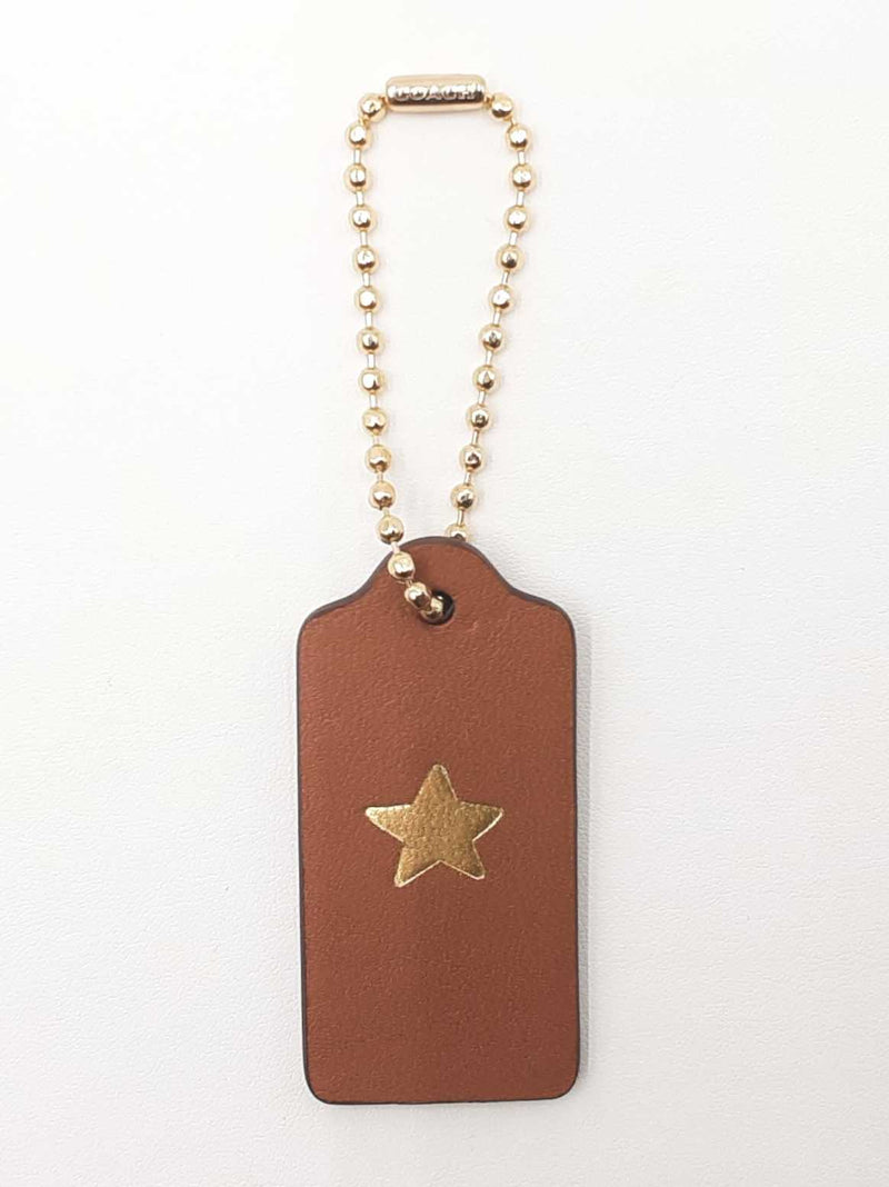 Coach Logo & Star Hang Tag In Brown Leather Fw0725lxdu