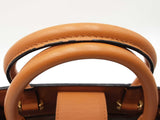 Mcm Essential Medium Tote Bag In Cognac Visetos Coated Canvas Fw0525ozxdu