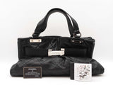 Chanel Mademoiselle Door Latch Tote In Diamond-quilted Black Leather Fw0925rxzdu