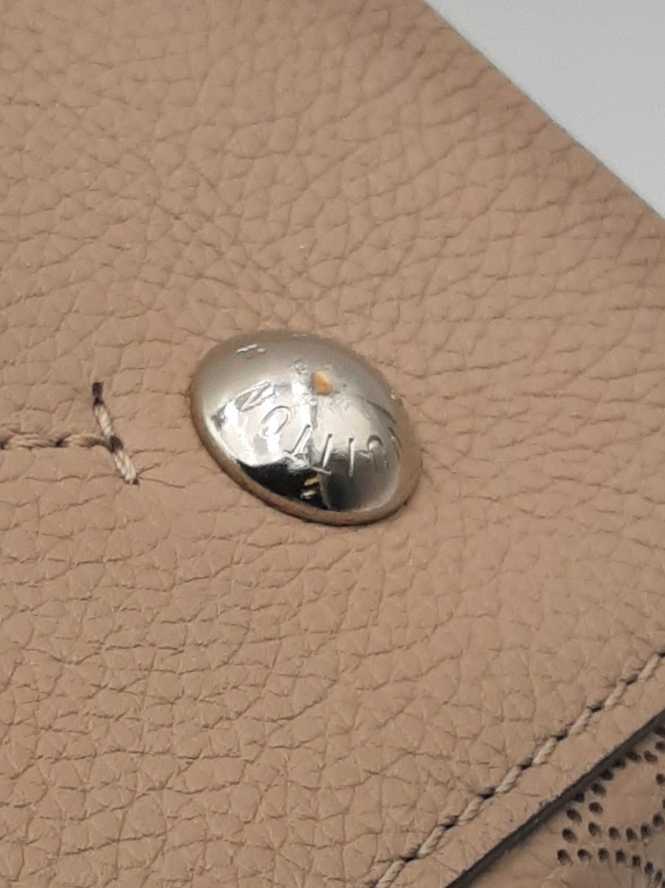 Louis Vuitton Perforated Monogram Mahina Leather Muria Bucket Bag Sd0325irzsa