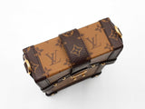 Louis Vuitton Pochette Trunk Verticale In Reverse Monogram Coated Canvas Fw0626loxzdu