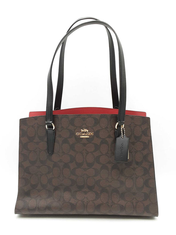 Coach Tatum Carryall Bag In Signature Coated Canvas Fw0825ozdu