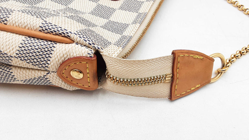 Louis Vuitton Eva Convertible Clutch In Damier Azur Coated Canvas Fw1125wordu