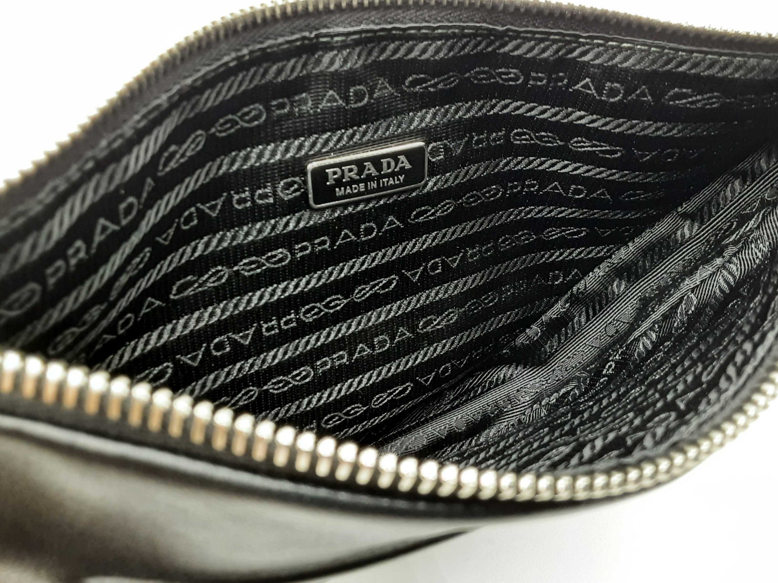 Prada Triangle Embossed Logo Black Leather Clutch